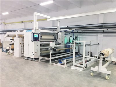 Machine de stratification de colle thermofusible de tissu/film